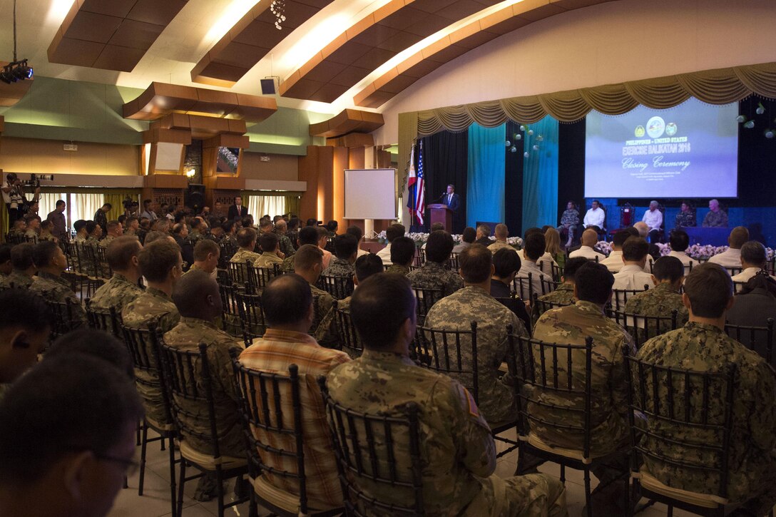 Audience members listen as Defense Secretary Ash Carter delivers remarks during the closing ceremony of Exercise Balikatan 2016 in Manila, Philippines, April 15, 2016. DoD photo by Air Force Senior Master Sgt. Adrian Cadiz