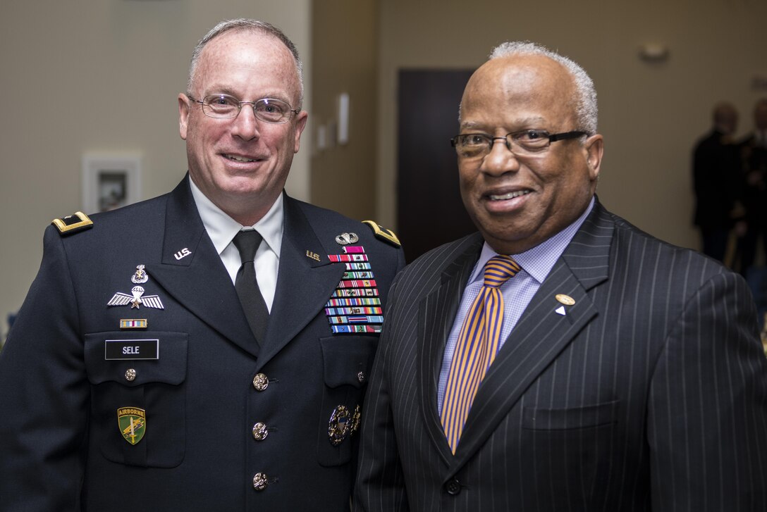 Brig. Gen. Richard Sele, 108th Training Command Deputy Commanding General (left), gets a photo op with retired Command Sgt. Maj. John Scott (right) at the North Carolina A&T State University ROTC Hall of Fame induction ceremony in Greensboro, N.C., Apr. 14, 2016. Scott served as senior enlisted advisor at the school from 1986 until 1988. Sele was inducted into the school's ROTC Hall of Fame on Apr. 14, 2016. The event was held at the Alumni Center as a part of the centennial celebration of the Reserve Officers' Training Corps. (U.S. Army photo Sgt. 1st Class Brian Hamilton/released)