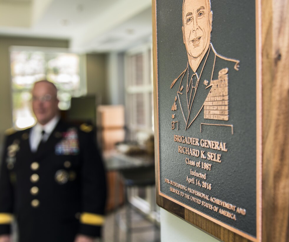 A plaque displaying the image of the 108th Training Command (IET) Deputy Commanding General, Brig. Gen. Richard Sele, is proudly displayed in the Veterans' Center at the University of North Carolina at Greensboro. Sele received his commission to 2nd Lt. at the University of North Carolina A&T State University in 1987 and was inducted into that schools ROTC Hall of Fame, Apr. 14, 2016. This year marks the 100th anniversary of the ROTC program and the ceremony was part of that celebration.(U.S. Army photo Sgt. 1st Class Brian Hamilton/released)