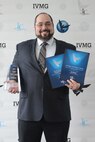 Justin Weisbarth. a contractor from Ball Aerospace and Technology Corporation and a member of NASIC’s Threat Visualization team, celebrates his three finalist awards during the Intelligence Community Media Excellence Awards ceremony at National Reconnaissance Office Virginia, March 17. This marks the first time a NASIC member has won an ICy award. 
