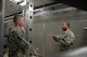 U.S. Air Force Tech. Sgt. Dexter Gore, right, the 509th Communications Squadron NCO in charge of intrusion detection systems, discusses an infrared perimeter intrusion detections system in the Air Force Global Strike Command’s electronic security systems training lab with Staff Sgt. Robert Thomas, left, the 90th Communications Squadron NCO in charge of visual imagery and intrusion detection systems, at Whiteman Air Force Base, Mo., April 13, 2016. Eleven Airmen from the 90th Missile Wing at F.E Warren Air Force Base, Wyo., participated in a sister wing exchange at Whiteman to connect and share information and ideas. 