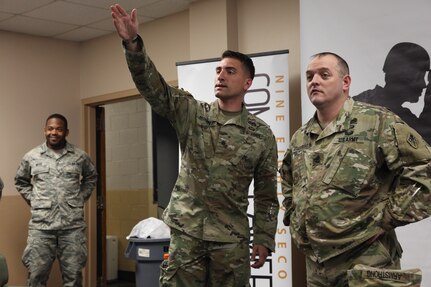U.S. Army Staff Sgt. Justin Morelli, assigned to the 982nd Combat Camera Company (Airborne), introduces Sgt. Maj. William Armstrong, the Visual Information proponet from the U.S. Army Signal School, to U.S. and partner nation service members during Operation Skyfall USA (OS-U) on Fort Gordon, Ga., April 12, 2016. OS-U is a 982nd Combat Camera Company (Airborne) Theater Security Cooperation initiative. OS-U is a joint, multi-component, multi-lateral Combat Camera subject matter expert exchange taking place in multiple locations in Georgia. OS-U is part of a series that includes OS-Deutschland, OS-France, and OS-Kosovo. (U.S. Army photo by Spc. Joshua Wooten/Released)