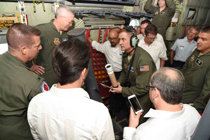 Lt. Gen. William H. Etter (top left), Commander, Continental North American Aerospace Defense Region-1st Air Force (Air Forces Northern), listens to Chief Master Sgt. Rick Cumbo, 53rd Weather Reconnaissance Squadron weather reconnaissance loadmaster, explain to Mexican officials how a dropsonde collects weather data during hurricane flights. The general, along with Refael Pacchiano Alaman (bottom left), Secretary of Environment and Natural Resources, Mexico, and Roberto Ramirez de la Parra (bottom right), Director General of Con Agua, Mexico, (second from right), 53rd WRS “Hurricane Hunters” and National Oceanic and Atmospheric Administration officials flew on a Hurricane Hunter WC-130J weather aircraft from Cabo San Lucas to Puerto Vallarta, Mexico, April 12, during the first part of the 2016 Caribbean Hurricane Awareness Tour, which promotes hurricane preparedness throughout the Central American and Caribbean regions. 