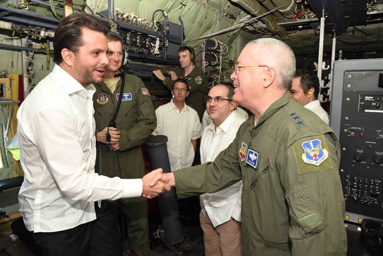 Lt. Gen. William H. Etter, Commander, Commander, Continental North American Aerospace Defense Region-1st Air Force (Air Forces Northern), thanks Refael Pacchiano Alaman, Secretary of Environment and Natural Resources, Mexico, and Roberto Ramirez de la Parra, Director General of Con Agua, Mexico, (second from right) for the strong partnership and working relationships between the United States and Mexican governments on hurricane preparedness. The general, Mexican officials, 53rd Weather Reconnaissance Squadron “Hurricane Hunters” and National Oceanic and Atmospheric Administration officials flew on a Hurricane Hunter WC-130J weather aircraft from Cabo San Lucas to Puerto Vallarta, Mexico, April 12, during the first part of the 2016 Caribbean Hurricane Awareness Tour, which promotes hurricane preparedness throughout the Central American and Caribbean regions. 