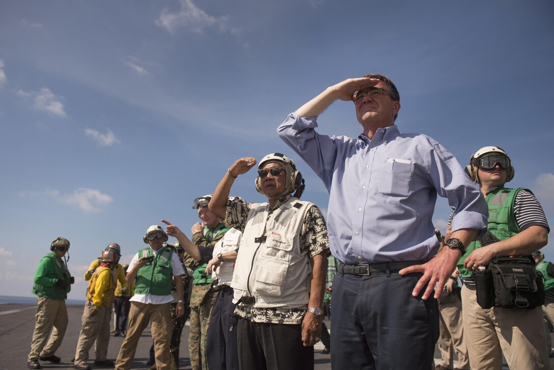 Defense Secretary Ash Carter and Philippine Defense Secretary Voltaire Gazmin observe flight deck operations as they tour the USS John C. Stennis in the South China Sea, April 15, 2016. DoD photo by Air Force Senior Master Sgt. Adrian Cadiz