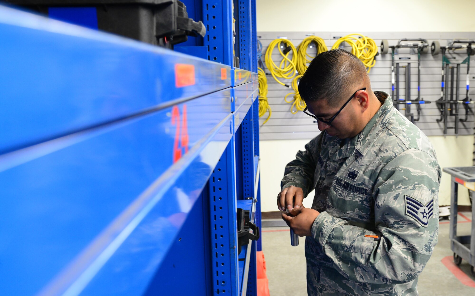 U.S. Air Force Staff Sgt. Jacob Maldonado, a 354th Aircraft Maintenance Squadron weapons expediter, completes an annual supervisory check April 13, 2016, at Eielson Air Force Base, Alaska. Maldonado conducts these checks to make sure tools are in serviceable condition. (U.S. Air Force photo by Airman 1st Class Cassandra Whitman/Released)