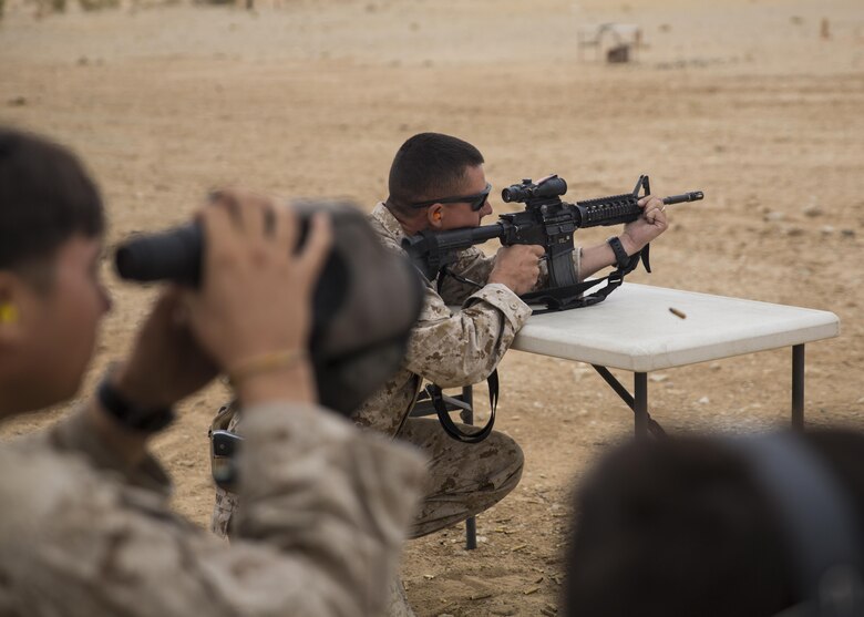 1st Lt. Jeremy Spray, motor transport officer, 1st Combat Engineer Battalion, fires an M4 service rifle during the Western Regional Combat Match April 7, 2016. (Official Marine Corps photo by Cpl. Connor Hancock/Released)