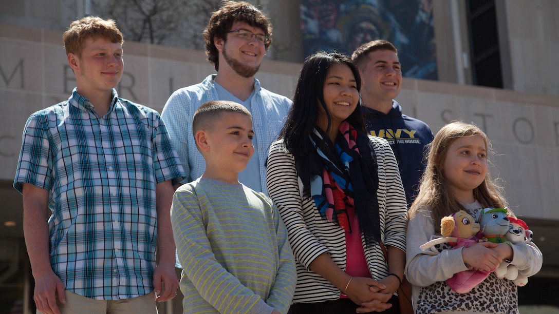 The recipients of the Military Child of the Year Award pose for a photo in front of the National Museum of American History April 13. According to the Operation Homefront website, the award recognizes military children who have demonstrated themselves as exceptional citizens while facing the challenges of military family life. Christian Fagala (bottom left), 9, is the Marine Corps recipient of the award. 