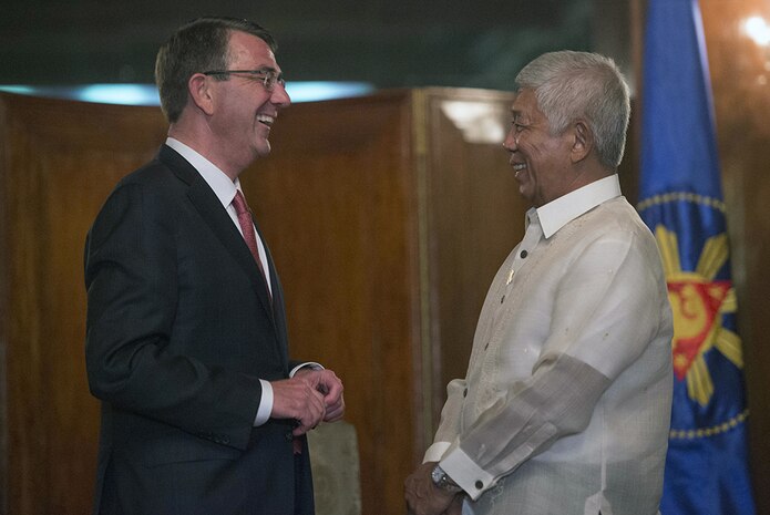 Secretary of Defense Ash Carter shares a light moment  with Philippine Secretary of National Defense Voltaire Gazmin as they meet to discuss matters of mutual importance at the Malacanang Palace in Manila, Philippines April 14, 2016. Carter is visiting the Philippines to solidify the rebalance to the Asia-Pacific region