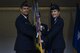 Brig. Gen. Jeannie M. Leavitt (right) assumes command of the 57th Wing from Brig. Gen. Paul A. Welch, U.S. Air Force Warfare Center vice commander, during a change of command ceremony at the Strike Aircraft Maintenance Unit hangar at Nellis Air Force Base, Nev., April 15. Leavitt is responsible for 34 squadrons at 13 installations constituting the Air Force's most diverse flying wing. (U.S. Air Force photo by Airman 1st Class Kevin Tanenbaum)