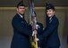 Brig. Gen. Jeannie M. Leavitt (right) assumes command of the 57th Wing from Brig. Gen. Paul A. Welch, U.S. Air Force Warfare Center vice commander, during a change of command ceremony at the Strike Aircraft Maintenance Unit hangar at Nellis Air Force Base, Nev., April 15. Leavitt is responsible for 34 squadrons at 13 installations constituting the Air Force's most diverse flying wing. (U.S. Air Force photo by Airman 1st Class Kevin Tanenbaum)