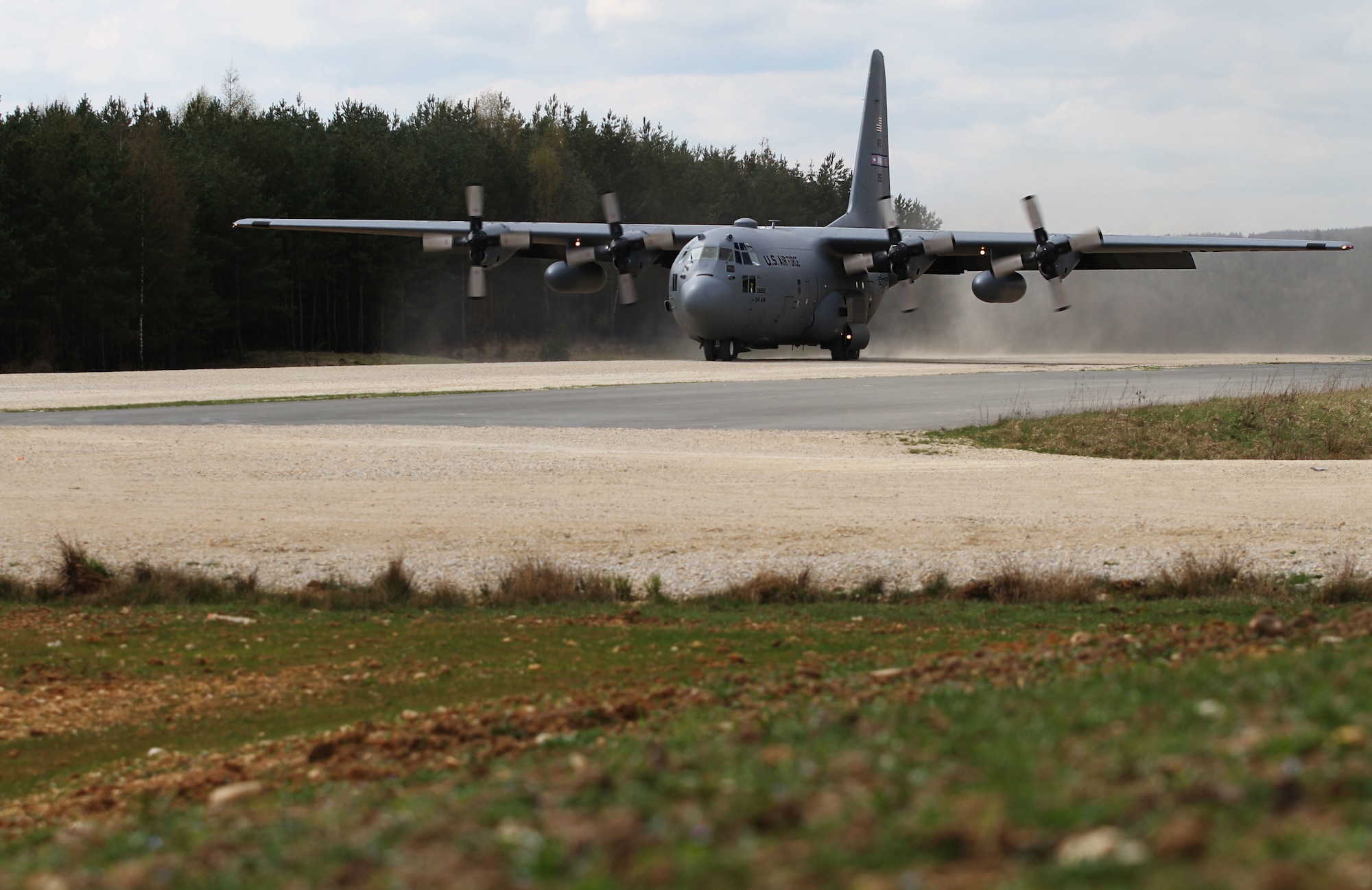 Airmen from the 321st Special Tactics Squadron, out of the Royal Air Force Station in Suffolk, England and Soldiers from the 173rd Airborne Brigade out of Vicenza, Italy, conduct fast-paced landing and take-off maneuvers for several hours, refining their timing, efficiency, and communication, for Saber Junction 16. SJ16 is the U.S. Army Europe’s 173rd Airborne Brigade’s combat training center certification exercise, taking place at the Joint Multinational Readiness Center in Hohenfels, Germany, March 31-April 24, 2016. The exercise is designed to evaluate the readiness of the Army’s Europe-based combat brigades to conduct unified land operations and promote interoperability in a joint, multinational environment. SJ16 includes nearly 5,000 participants from 16 NATO and European partner nations. (U.S. Army photo by Spc. Sarah K. Anwar)