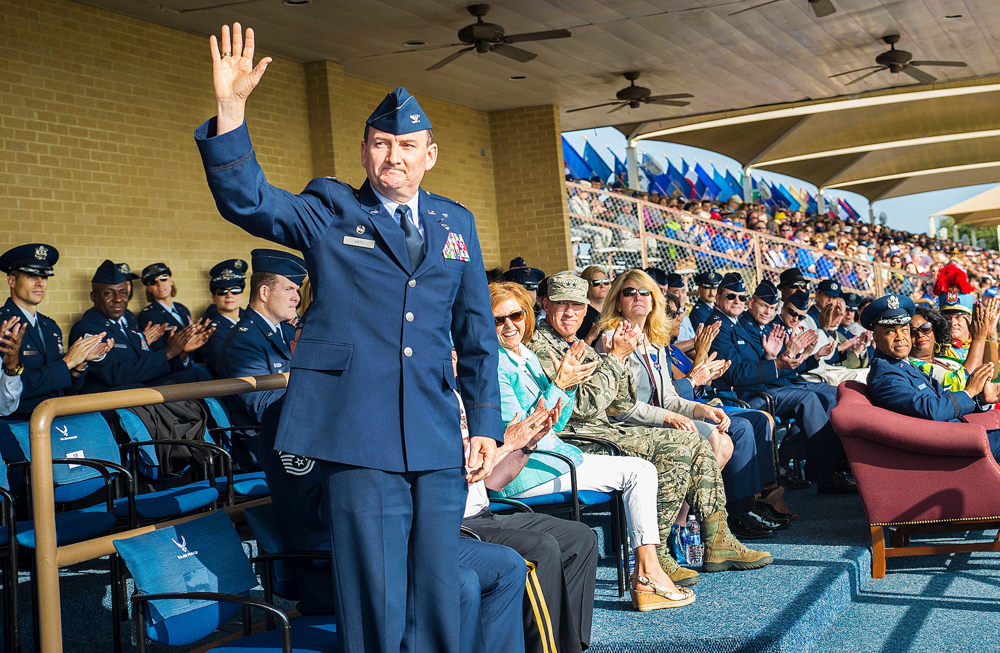 Col. Thomas K. Smith Jr. 433rd Airlift Wing commander, is recognized at the Basic Training Parade April 15, 2016 at Joint Base San Antonio-Lackland, Texas. The parade recognized special distinguished  visitors and members of the official Fiesta organization. 