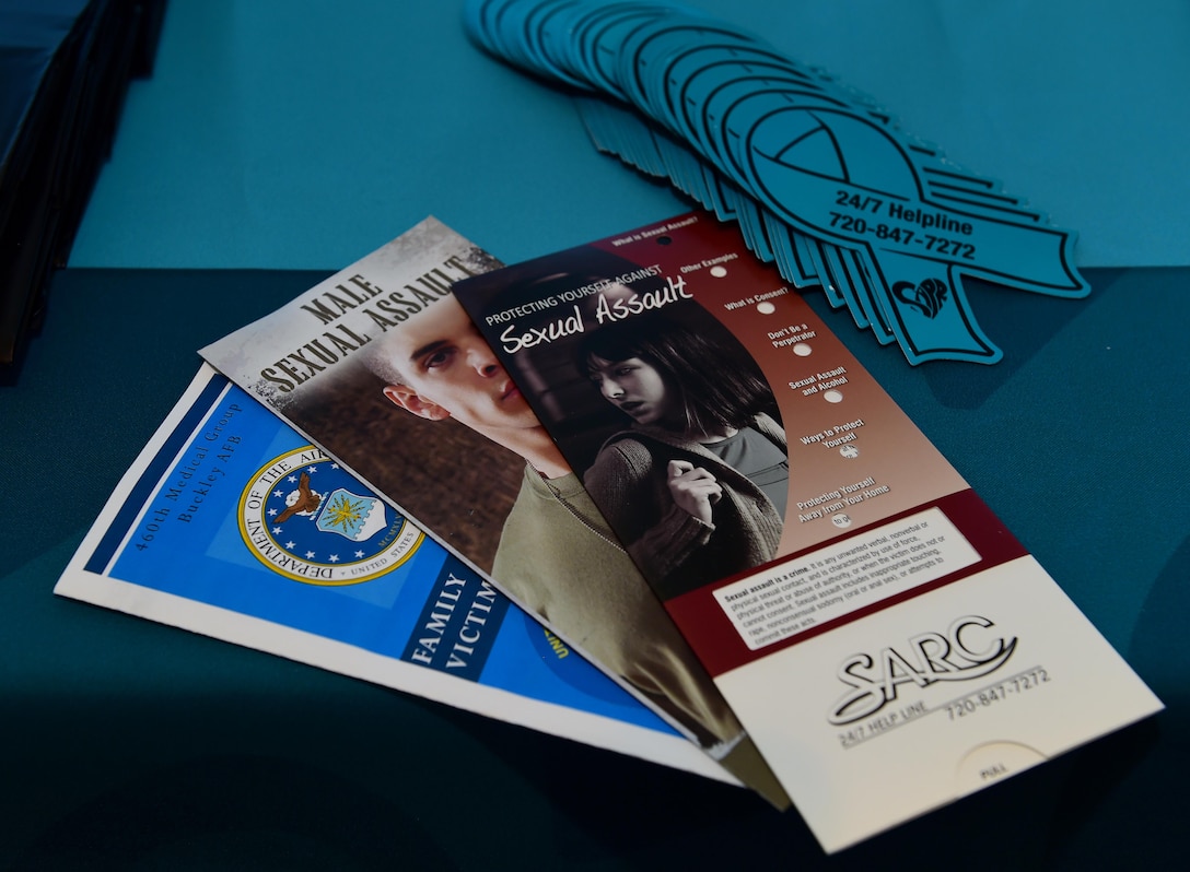 Free Sexual Assault Prevention and Response Program gifts sit on a table before a SAPR workshop April 14, 2016, at the Leadership Development Center on Buckley Air Force Base, Colo. The workshop, “A Close-up Look at Female Sex Offenders in ‘Positions of Trust,’” examined the dynamics of teacher and student relationships and the way gender impacts disclosure, reporting, arrests, public response, prosecution and sentencing. (U.S. Air Force photo by Airman 1st Class Gabrielle Spradling/Released)