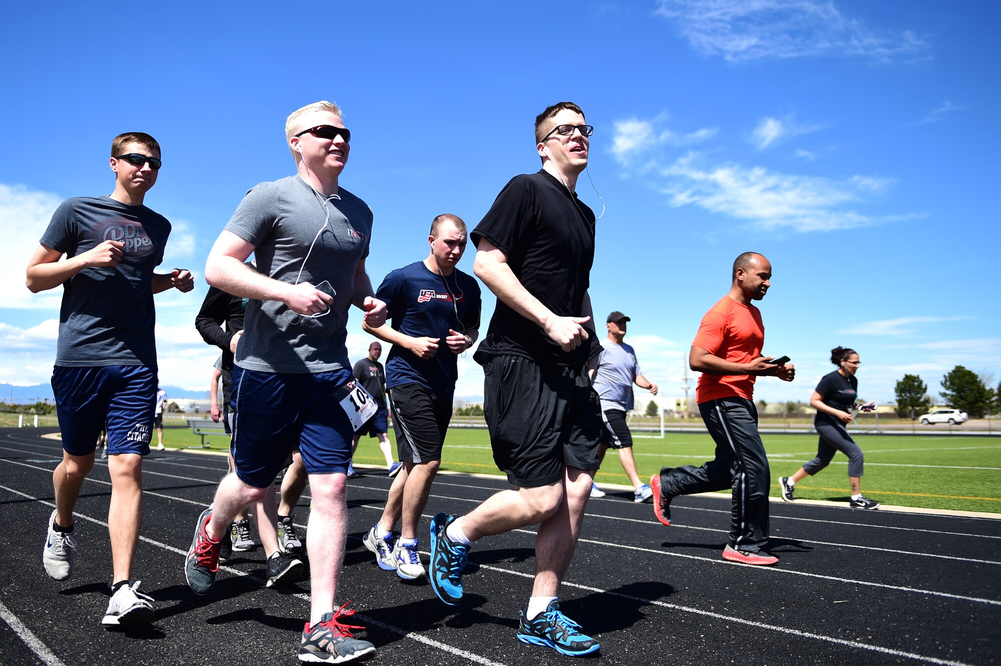 Team Buckley members participate in the Dash to Distance 5K April 14th, 2016, on Buckley Air Force Base, Colo. The Dash to Distance race series from April to September range from a 5K to a half marathon. (U.S. Air Force photo by Senior Airman Racheal E. Watson/Released)