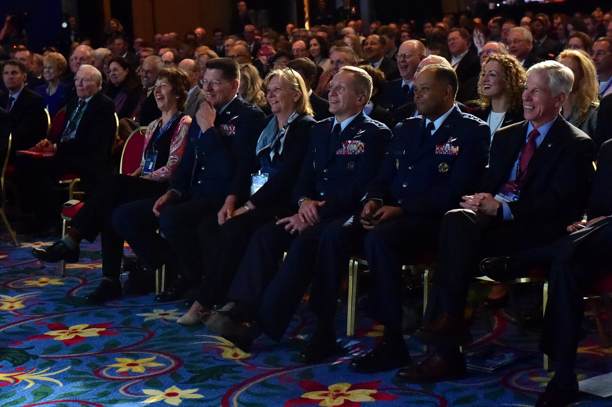 Audience members laugh during Gen. John Hyten’s, commander of Air Force Space Command, speech April 12, 2016, at the Space Symposium at the Broadmoor Hotel in Colorado Springs, Colo. The symposium has brought together space leaders from around the world for more than 30 years to address the progression and future of space. (U.S. Air Force photo by Airman 1st Class Gabrielle Spradling/Released)