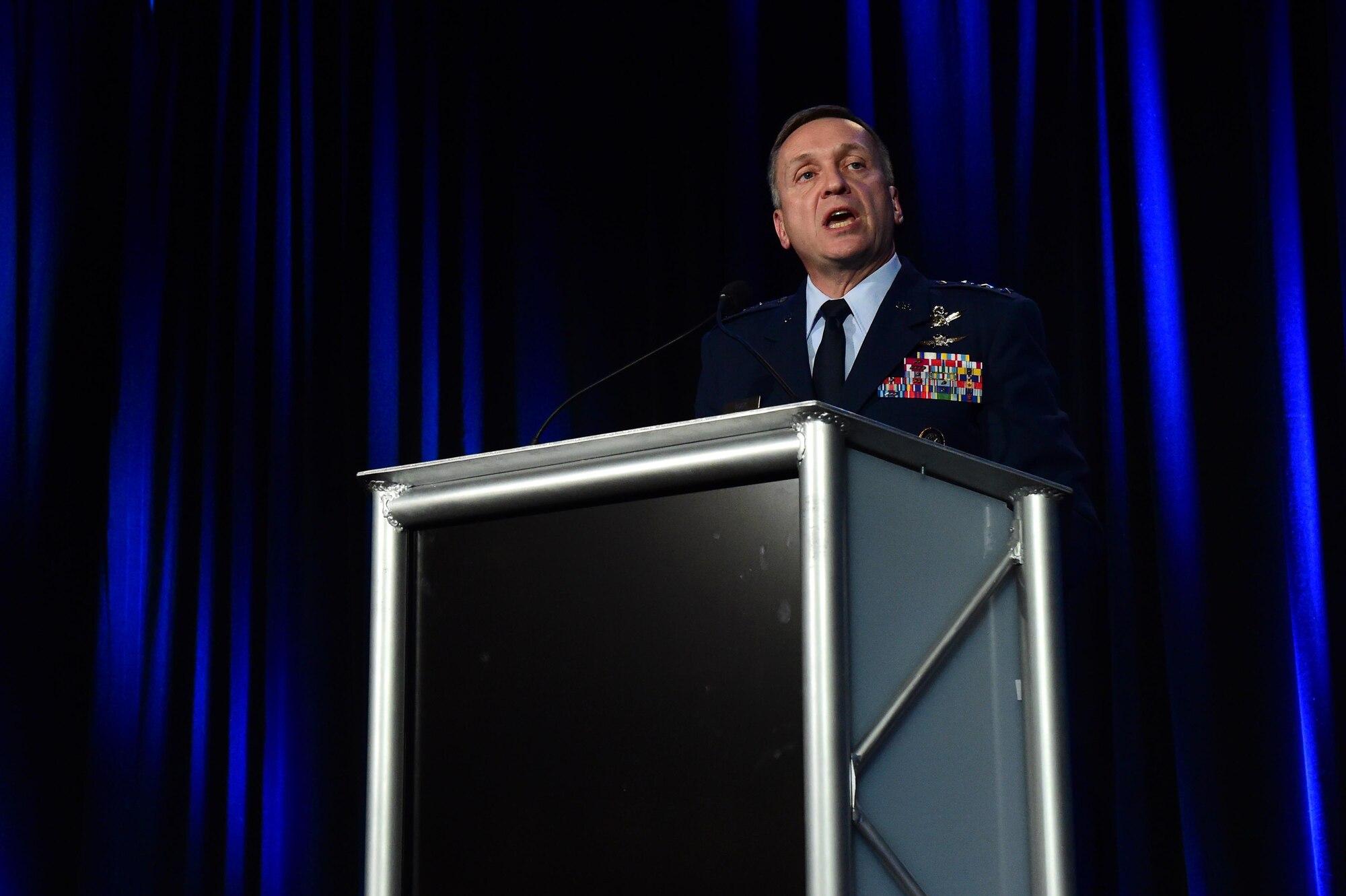 Lt. Gen. David Buck, Commander, 14th Air Force (Air Forces Strategic), Air Force Space Command; and Commander, Joint Functional Component Command for Space, U.S. Strategic Command speaks during the Space Warfighters luncheon April 12, 2016, at the Broadmoor Hotel in Colorado Springs, Colo. Buck focused on the role space assets play in keeping troops safe, informed and effective around the world. (U.S. Air Force photo by Airman 1st Class Gabrielle Spradling/Released)