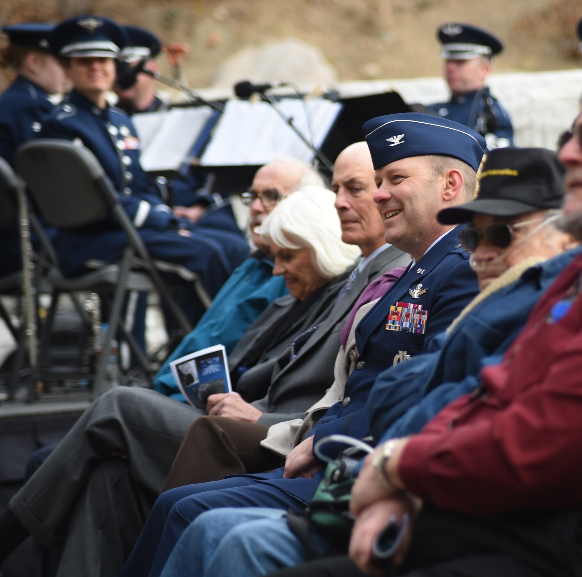 CHEYENNE MOUNTAIN AIR FORCE STATION, Colo. – Col. Doug Schiess, 21st Space Wing commander, reacts to comments made by Colorado Gov. John Hickenlooper during the 50th Anniversary Rededication Ceremony at Cheyenne Mountain Air Force Station April 15, 2016. After nearly five years of construction, Cheyenne Mountain Air Force Station was declared fully operational April 20, 1966. Cheyenne Mountain AFS is owned by the 21st Space Wing at Peterson Air Force Base, and operated by the 721st Mission Support Group. (U.S. Air Force photo by Airman 1st Class Dennis Hoffman)