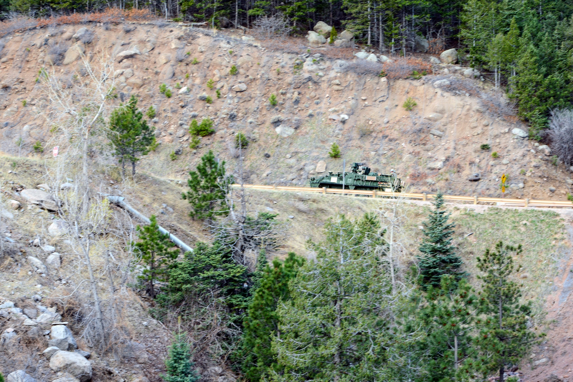 CHEYENNE MOUNTAIN AIR FORCE STATION, Colo. - Stryker vehicles from the 1st Stryker Brigade Combat Team, 4th Infantry Division at Fort Carson, Colo., make the climb up Cheyenne Mountain Road to help support the 50th Anniversary Rededication Ceremony at Cheyenne Mountain Air Force Station April 15, 2016. Since its inception during the Cold War through the war on terrorism, Cheyenne Mountain has remained critical to the defense mission providing command and control for the nation since 1966. Cheyenne Mountain AFS is owned by the 21st Space Wing at Peterson Air Force Base, and operated by the 721st Mission Support Group. (U.S. Air Force photo by Master Sgt. Jared Marquis)