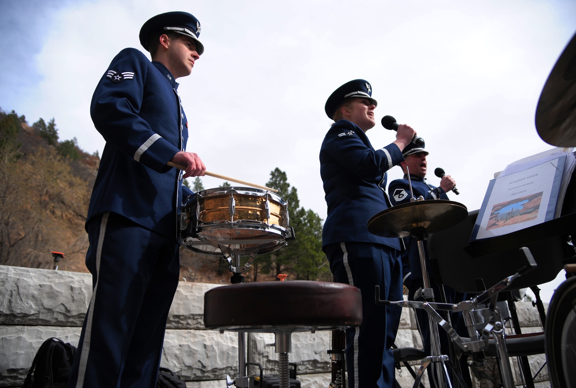 CHEYENNE MOUNTAIN AIR FORCE STATION, Colo. - Members of the United States Air Force Academy band perform the national anthems of the U.S. and Canada during the 50th Anniversary Rededication Ceremony at Cheyenne Mountain Air Force Station April 15, 2016. Since its inception during the Cold War through the war on terrorism, Cheyenne Mountain has remained critical to the defense mission providing command and control for the nation since 1966. Cheyenne Mountain AFS is owned by the 21st Space Wing at Peterson Air Force Base, and operated by the 721st Mission Support Group. (U.S. Air Force photo by Staff Sgt. Amber Grimm)