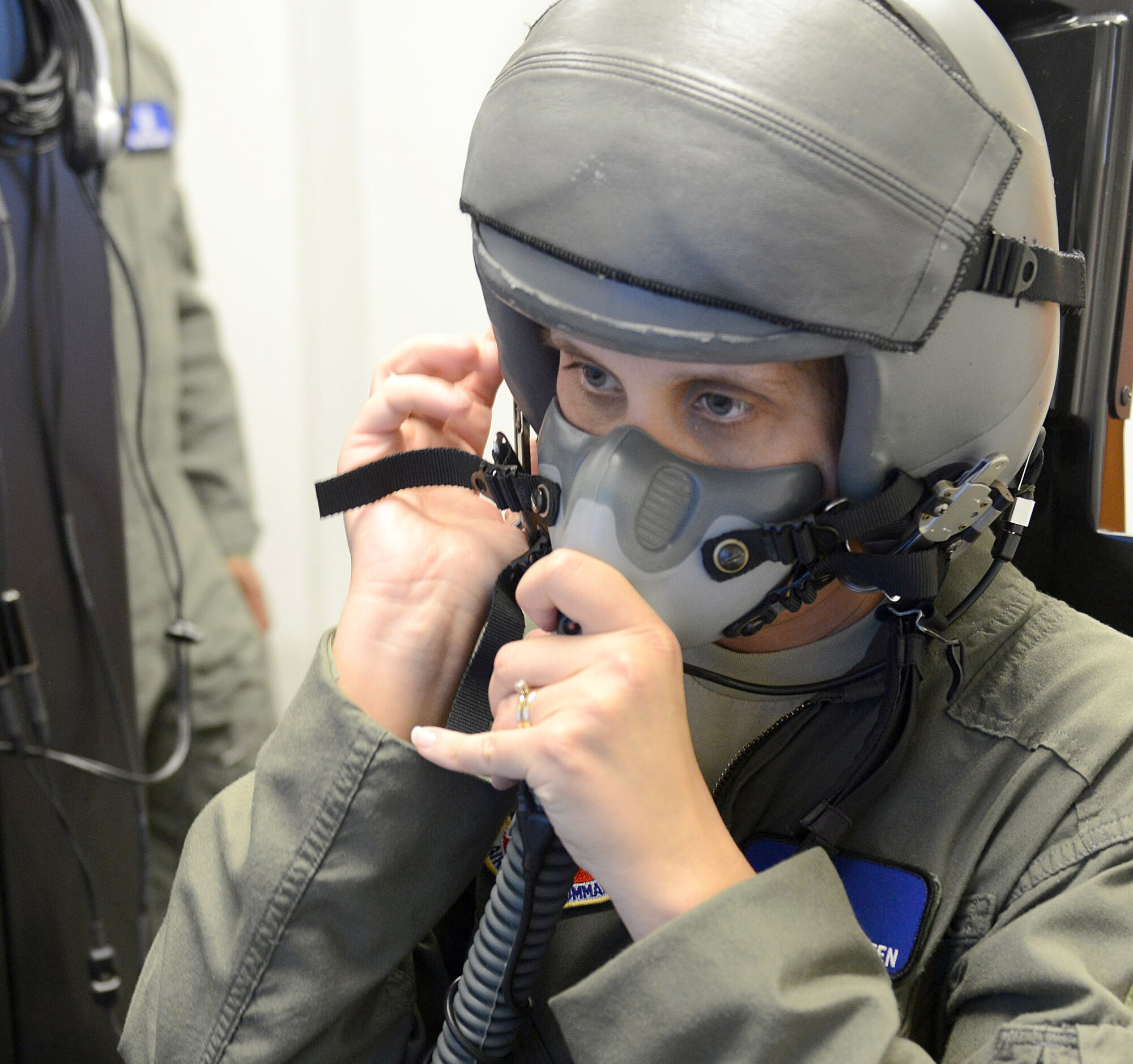 Technical Sgt. Leslie Batten, 461st Operations Support Squadron Aerospace and Operational Physiology NCOIC, demonstrates the unit’s new state-of-the art hypoxia familiarization trainer. The squadron’s ability to train military aircrews who fly aboard the E-8C Joint Surveillance Target Attack Radar System based at Robins, celebrated a milestone April 5 with the certification of the new equipment. (U.S. Air Force photo by Tommie Horton)