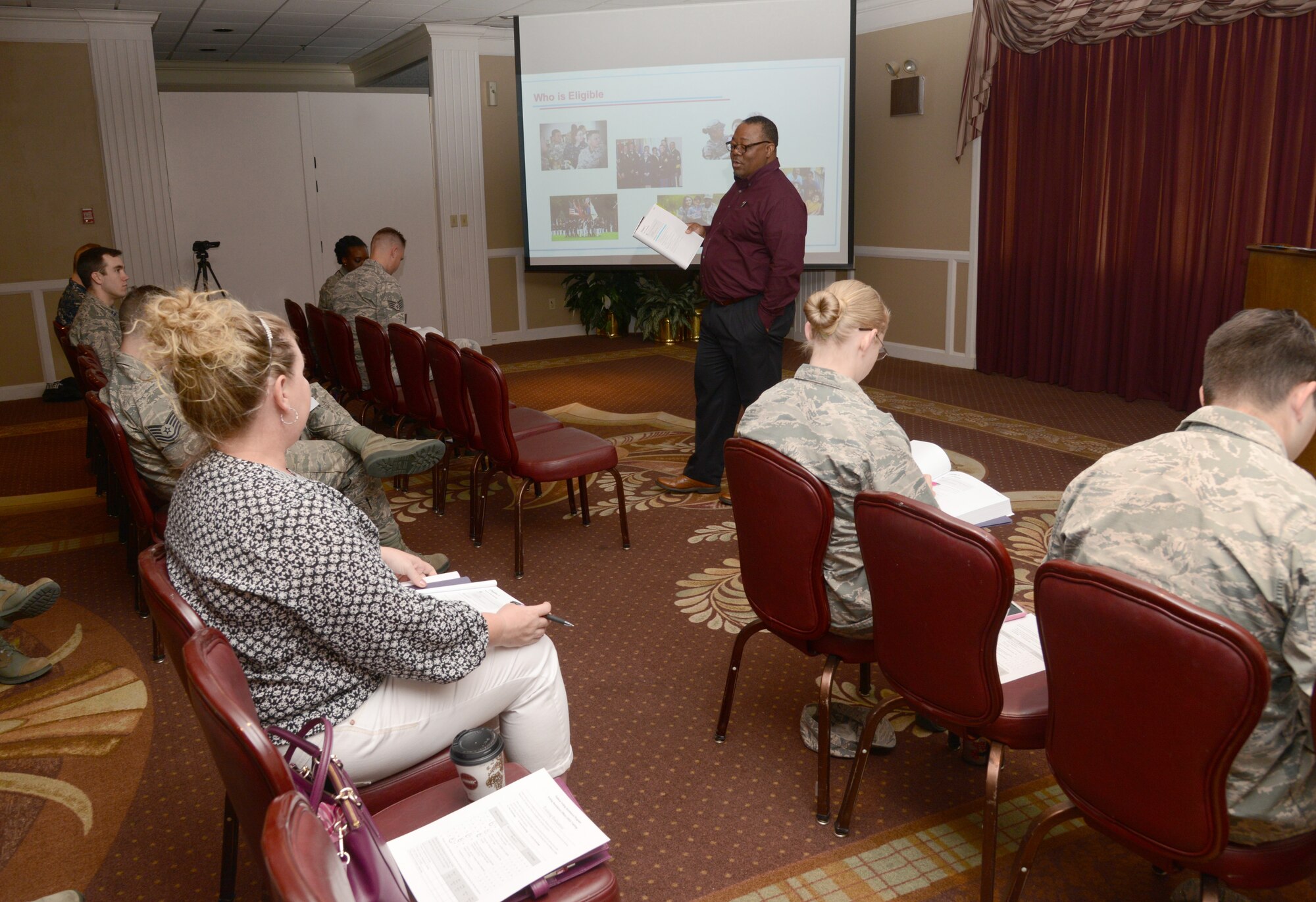 Kenneth Warford, deputy director of the Federal Voting Assistance Program, talks to voting assistance officers during an April 6 training session. The VAOs will be able to assist military members or their voting-age family members with any voting-related questions, especially if they are deployed or have PCS’d overseas. (Air Force photo by Kelly White/Released)


