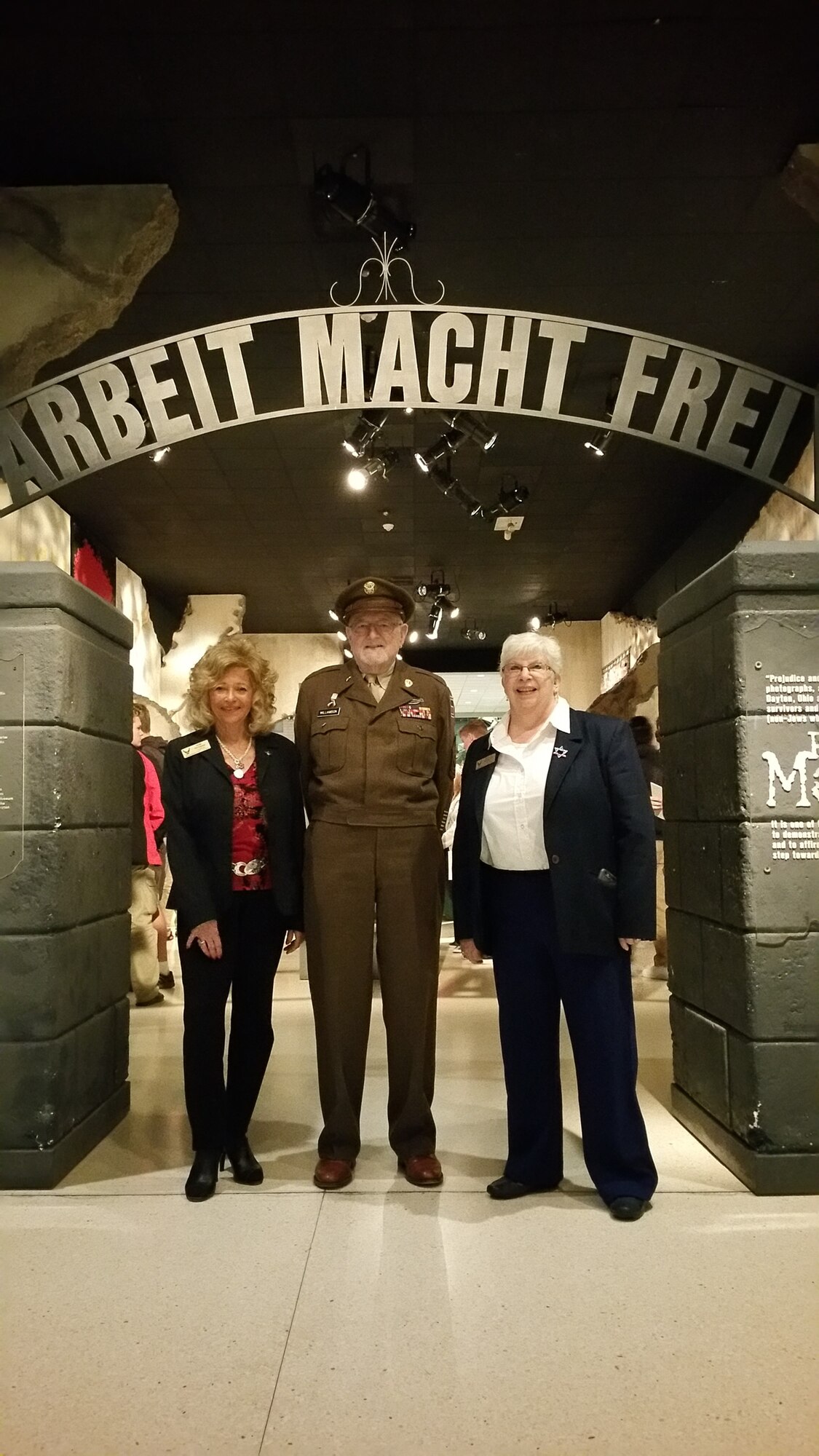 Dr. Renate Frydman, Henry Williamson and Marilou Brewster stand at the opening of the Prejudice & Memory: A Holocaust Exhibit April 12. (U.S. Air Force photo/Ken LaRock)