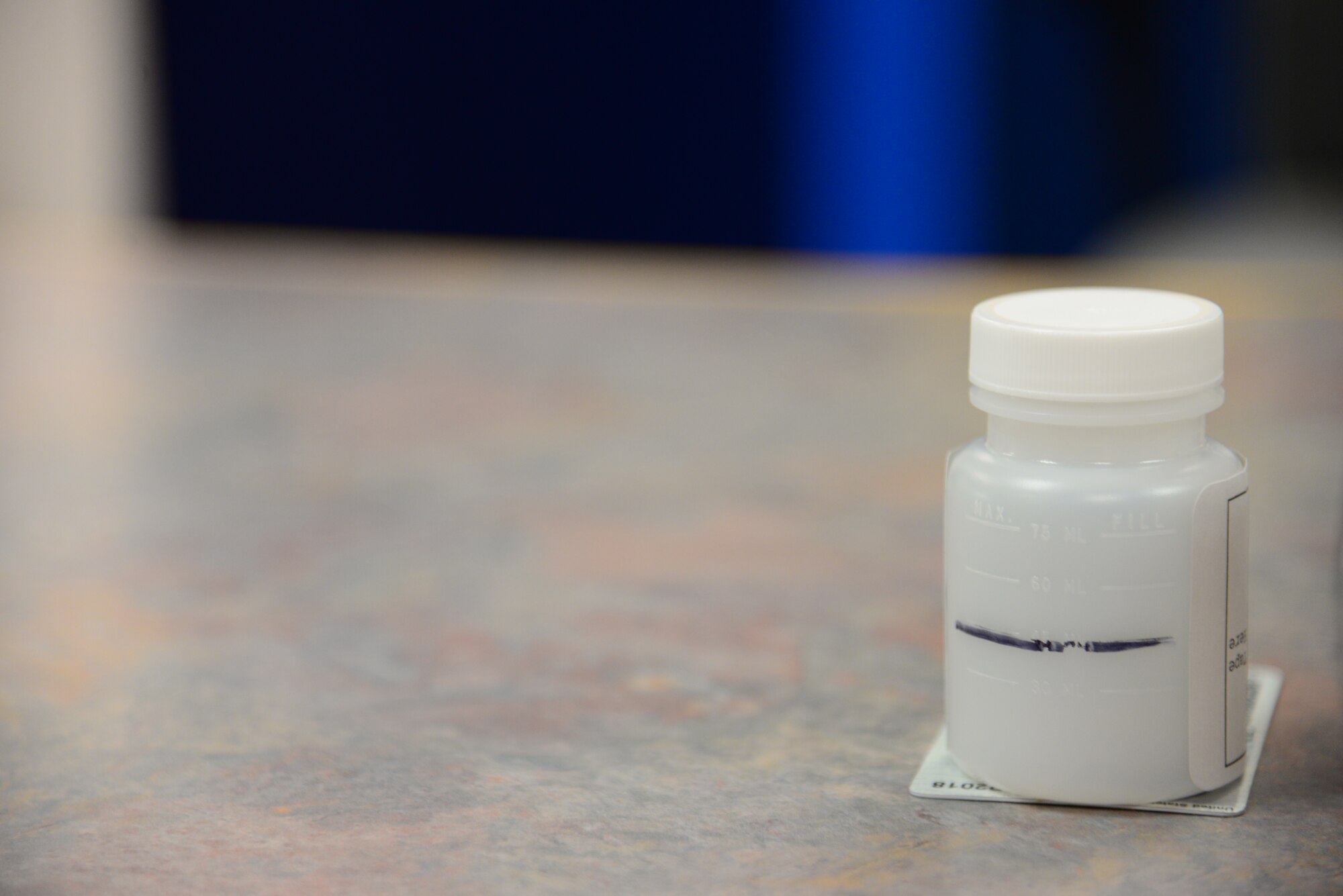 A sample container sits empty at the 341st Missile Wing Drug Demand Reduction Program office at Malmstrom Air Force Base, Mont. An average of 24 boxes of samples are shipped out for random drug testing per week. (U.S. Air Force photo/Airman 1st Class Magen M. Reeves)