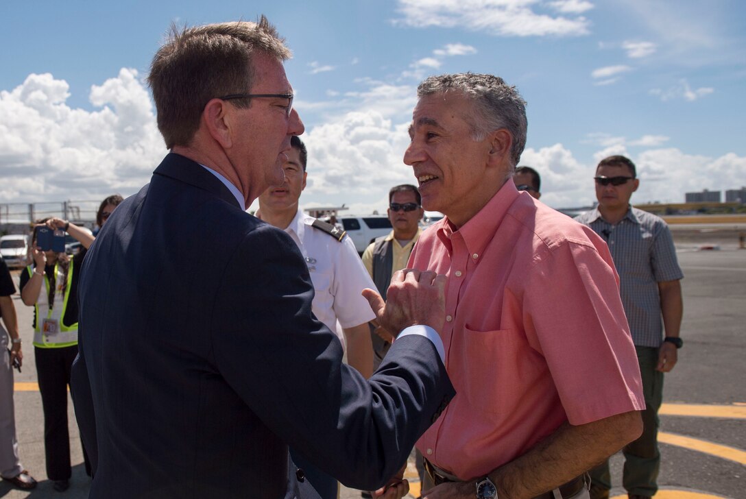 Defense Secretary Ash Carter says goodbye to Philip Goldberg, U.S. ambassador to the Philippines, as Carter departs the Philippines, April 16, 2016. Carter visited the Philippines in support of the rebalance to the Asia-Pacific region. DoD photo by Air Force Senior Master Sgt. Adrian Cadiz