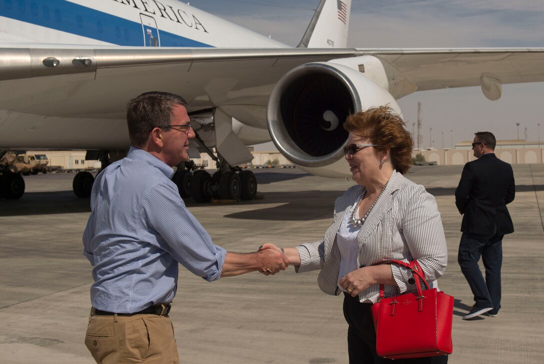 Defense Secretary Ash Carter shakes hands with Barbara Leaf, U.S. ambassador to the United Arab Emirates, at Al-Dhafra Air Base in the UAE, April 16, 2016. On his trip, Carter will visit the UAE and Saudi Arabia to assist the lasting defeat of the Islamic State of Iraq and the Levant, and participate in the U.S. Gulf Cooperation Council defense meeting. DoD photo by Air Force Senior Master Sgt. Adrian Cadiz
