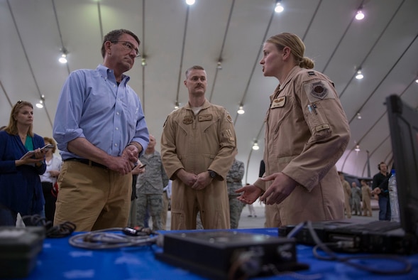 Defense Secretary Ash Carter talks to Airmen during a tour of Air Force assets at Al-Dhafra Air Base, United Arab Emirates, April 16, 2016. On his trip, Carter visited the UAE and Saudi Arabia to assist in the lasting defeat of the Islamic State of Iraq and the Levant, and to participate in the U.S. Gulf Cooperation Council defense meeting. (DoD photo/Senior Master Sgt. Adrian Cadiz)