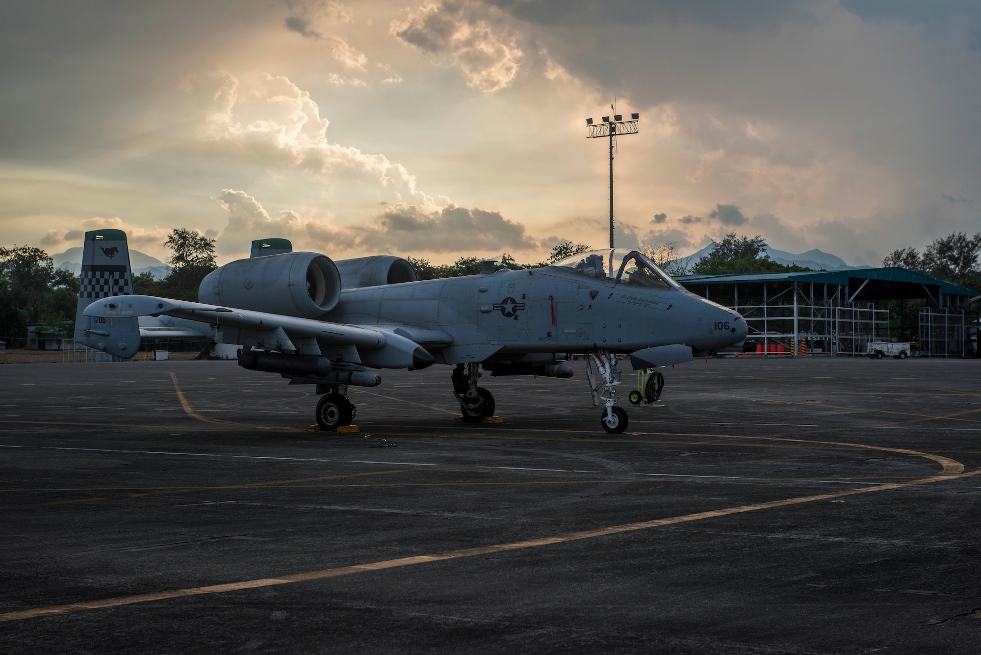 A U.S. Air Force A-10C Thunderbolt II, with the 51st Fighter Wing, Osan Air Base, Republic of Korea, sits on the flight line of Clark Air Base, Philippines, April 16, 2016, as part of a newly stood up Air Contingent in the Indo-Asia-Pacific region. The contingent's first iteration is comprised of five A-10Cs, three HH-60G Pavehawks and approximately 200 Pacific Air Forces personnel including aircrew, maintainers, logistics and support personnel. The A-10C were chosen as they were already in place supporting Exercise Balikatan 16 and have a proven record operating out of short and austere airstrips, provide a flexible range of capabilities, and have a mission profile consistent with the air and maritime domain awareness operations the air contingent will conduct. (U.S. Air Force photo by Staff Sgt. Benjamin W. Stratton)