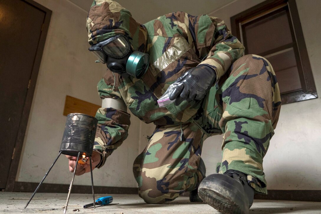 A soldier conducts chemical, biological, radiological and nuclear defense training at Joint Base Elmendorf-Richardson, Alaska, April 13, 2016. Air Force photo by Justin Connaher