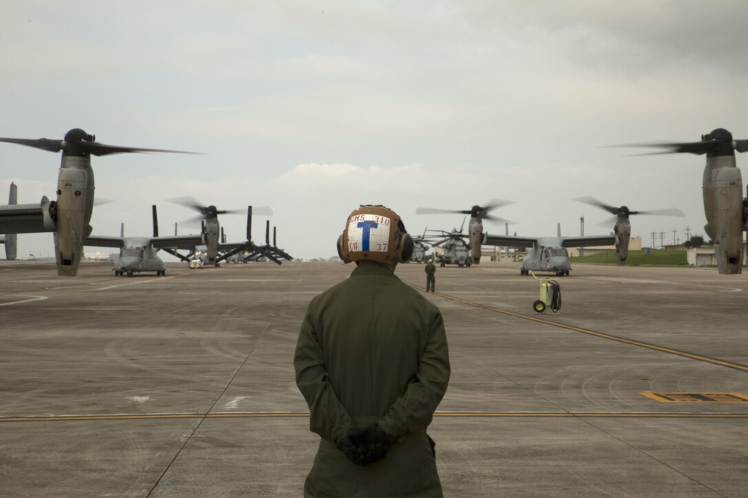 A Marine waits to guide MV-22 Ospreys with Marine Medium Tiltrotor Squadron 265, 31st Marine Expeditionary Unit, during their takeoff April 17, 2016 on Marine Corps Air Station Futenma. United States Forces, Japan is providing operational airlift support in coordination with the Government of Japan’s efforts to provide relief following the devastating earthquake near Kumamoto. “We express our deepest condolences to all of those affected by the recent earthquakes in Kyushu,” said Lt. Gen. John Dolan, commander of USFJ. “To the people of Japan and the region affected by this tragedy we send our heartfelt sympathies. The men and women of U.S. Forces, Japan stand with you during this difficult time.” The long-standing alliance between Japan and the U.S. allows U.S. military forces in Japan to provide rapid, integrated support to the Japanese Self-Defense Forces and civil relief efforts.