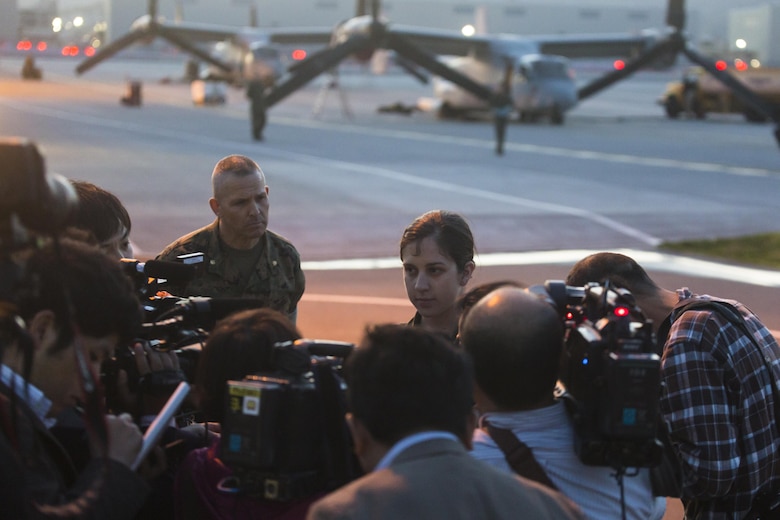 Japanese media interview an MV-22B Osprey pilot from Marine Medium Tiltrotor Squadron (VMM) 265 attached to the 31st Marine Expeditionary Unit at Marine Corps Air Station Iwakuni, Japan, in support of the Government of Japan’s relief efforts following yesterday’s devastating earthquake near Kumamoto April 17, 2016. The long-standing relationship between Japan and the U.S. allows U.S. military forces in Japan to provide rapid, integrated support to the Japan Self-Defense Forces and civil relief efforts. (U.S. Marine Corps photo by Lance Cpl. Jacob A. Farbo/Released)