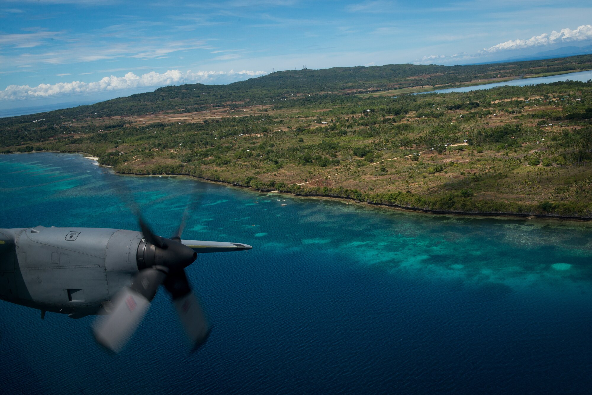 A 36th Airlift Squadron C-130 Hercules flies off the coast of Cebu, Philippines April 14, 2016. This year marks the 32nd iteration of Balikatan, an annual Philippine- U.S. alliance focused on a variety of missions, including humanitarian assistance, maritime law enforcement, and environmental protection. (U.S. Air Force photo by Staff Sgt. Michael Smith/ Released)