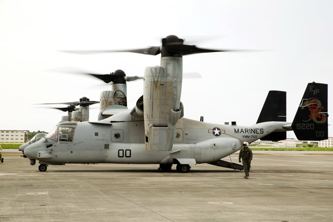 MV-22 Osprey aircraft prepare for takeoff at Marine Corps Air Station Futenma, Japan, April 17, 2016, to support relief efforts following a devastating earthquake near Kumamoto, Japan. Marine Corps photo by Cpl. Jessica Collins