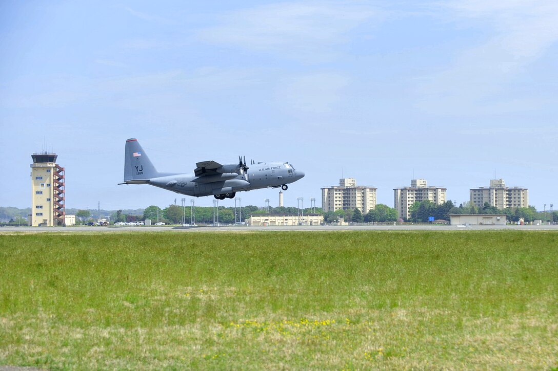 A C-130 Hercules aircraft takes off from Yokota Air Base, Japan, April 18, 2016, to support relief efforts following a devastating earthquake near Kumamoto, Japan. Navy photo by Petty Officer 3rd Class Markus Castaneda