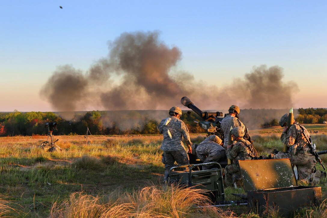 Paratroopers fire an M119A3 howitzer during Mungadai training mission at Fort Bragg, N.C., April 5, 2016. A "Mungadai" is name derived from a test once used hundreds of years ago by Genghis Khan for his Mongolian empire's army. The paratroopers are assigned to the 82nd Airborne Division's 2nd Battalion, 319th Airborne Field Artillery Regiment. Army photo by Staff Sgt. Jason Hull