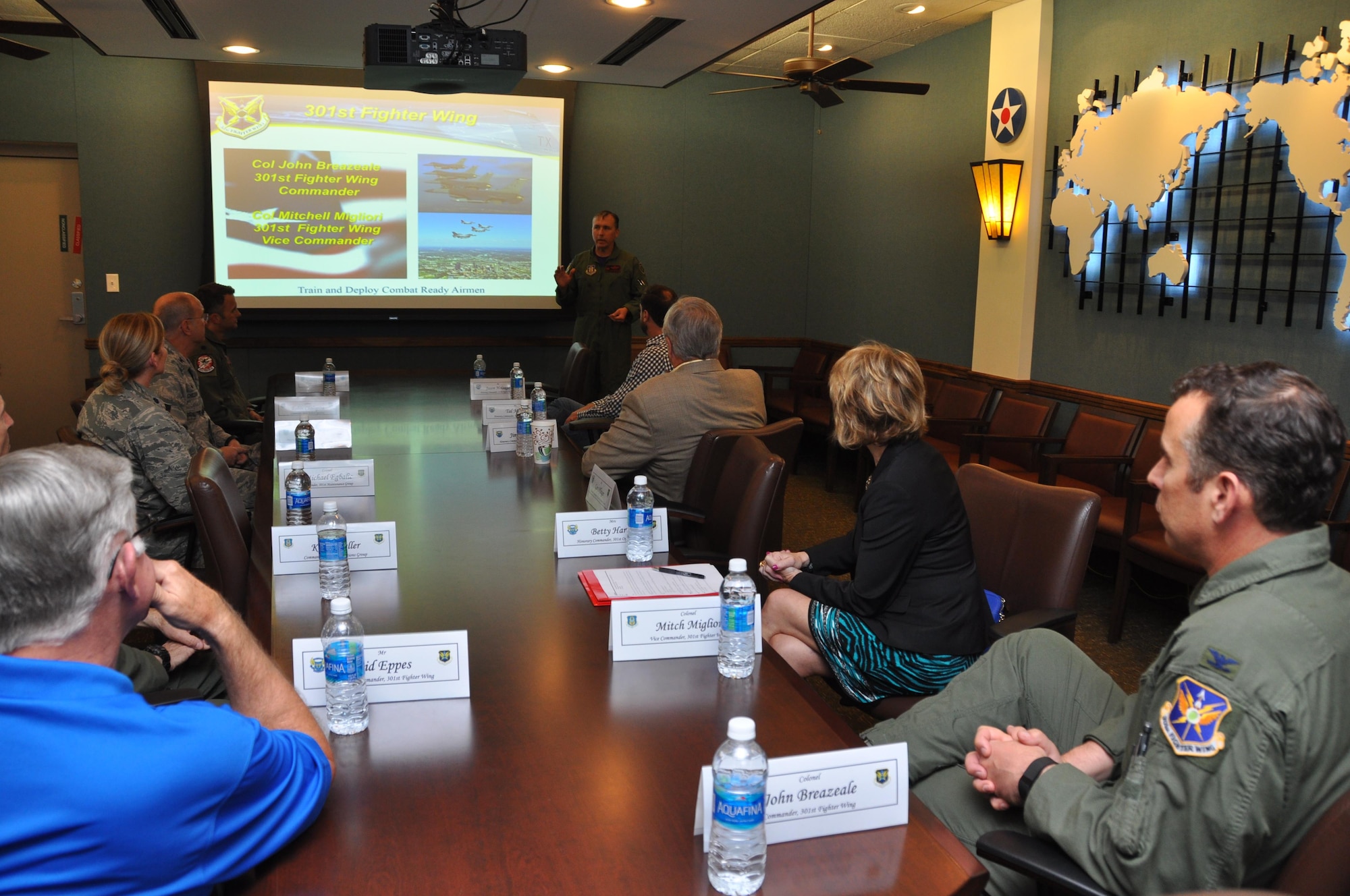 The 301st Fighter Wing honorary commanders receive a wing update April 8 at Naval Air Station Fort Worth Joint Reserve Base, Texas. Wing updates enhance the honorary commanders' understanding of the 301st mission and its capabilities. (U.S. Air Force photo by Julie Briden-Garcia)
