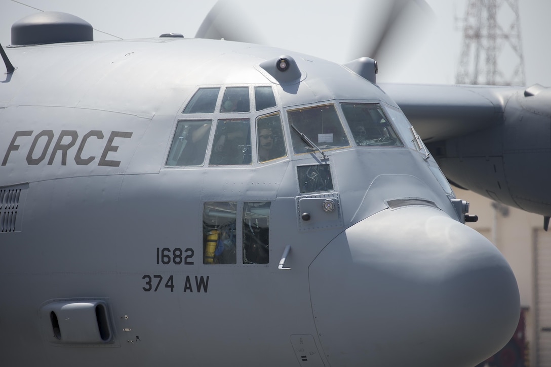 A C-130 Hercules taxis down the flightline at Yokota Air Base, Japan, April 18, 2016. The 374th Airlift Wing sent two aircraft in support of the government of Japan in their relief efforts for the series of earthquakes that took place in the Kyushu region recently. The aircraft transported heavy vehicles and personnel from Chitose Air Base, Hokkaido to Kyushu. (U.S. Air Force photo/Yasuo Osakabe)