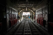 Members of the 934th Airlift Wing unload cargo upon arrival at Aviano AB, Italy, in support of Exercise Saber Junction. (U.S. Air Force photo by Staff Sgt. Trevor Saylor)