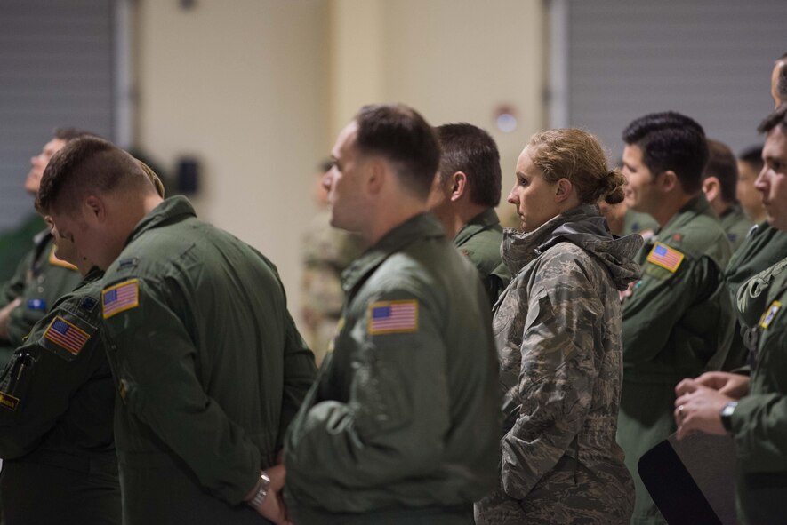 Major Michelle Morse,96th Airlift Squadron, listens to a joing briefing on Exercise Saber Junction at Aviano AB, Italy, April 9. (U.S. Air Force photo by Staff Sgt. Trevor Saylor)