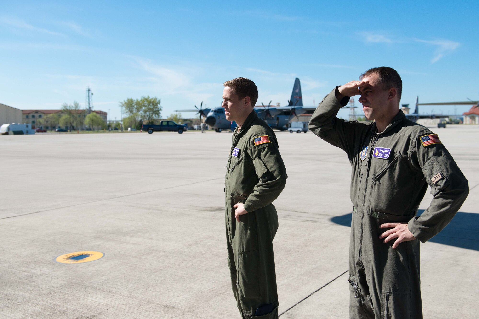 Tech. Sgt. David Stein, right, and Senior Airman Alec Miller, left, watch as cargo is delivered for loading onto a C-130 for airdrops in support of Exercise Saber Junction. (U.S. Air Force photo by Staff Sgt. Trevor Saylor)
