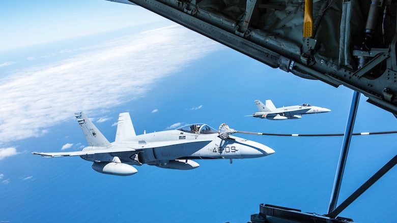 Spanish Air Force F/A-18 Hornet with 462 Squadron receive fuel from a U.S. Marine Corps KC-130J with Marine Aerial Refueler Transport Squadron 252, Special-Purpose Marine Air-Ground Task Force-Crisis Response- Africa during an aerial refuel mission, Gran Canaria, Spain, Mar. 29, 2016. SPMAGTF-CR-AF Marines and Spanish airmen conducted air-to-air refueling missions in order to enhance crisis response readiness and help build relationships between the two militaries. 