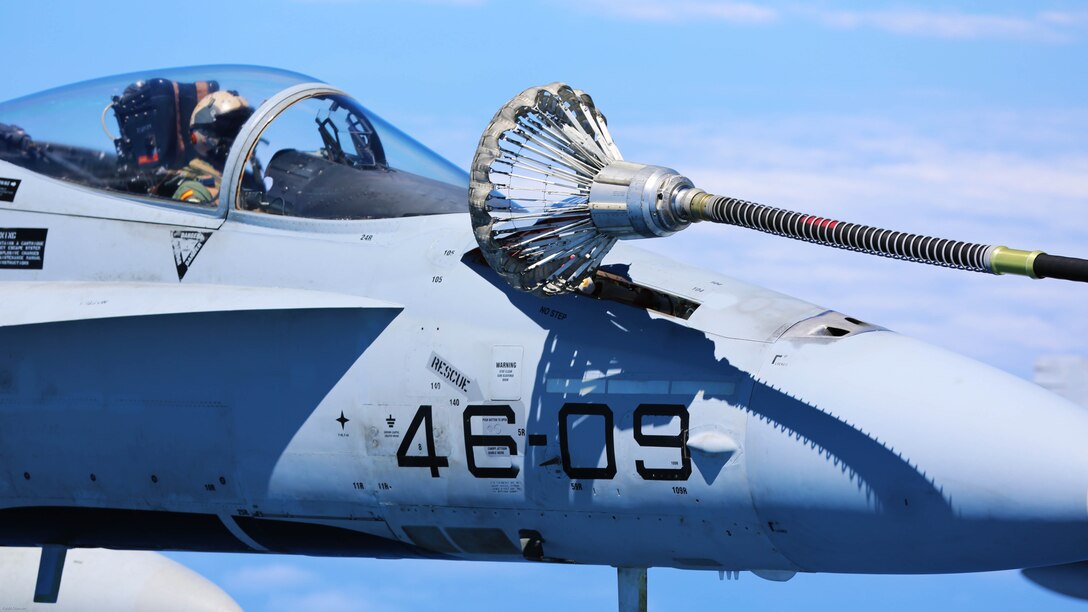 A Spanish Air Force F/A-18 Hornet with 462 Squadron receives fuel from a U.S. Marine Corps KC-130J with Marine Aerial Refueler Transport Squadron 252, Special-Purpose Marine Air-Ground Task Force-Crisis Response- Africa during an aerial refuel mission, Gran Canaria, Spain, Mar. 29, 2016. SPMAGTF-CR-AF Marines and Spanish airmen conducted air-to-air refueling missions in order to enhance crisis response readiness and help build relationships between the two militaries. 
