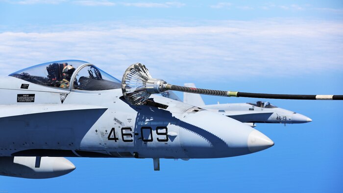 A Spanish Air Force F/A-18 Hornet with 462 Squadron receives fuel from a U.S. Marine Corps KC-130J with Marine Aerial Refueler Transport Squadron 252, Special-Purpose Marine Air-Ground Task Force-Crisis Response- Africa during an aerial refuel mission, Gran Canaria, Spain, Mar. 29, 2016. SPMAGTF-CR-AF Marines and Spanish airmen conducted air-to-air refueling missions in order to enhance crisis response readiness and help build relationships between the two militaries. 