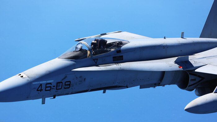 A Spanish Air Force F/A-18 Hornet with 462 Squadron breaks off after receiving fuel from a U.S. Marine Corps KC-130J with Marine Aerial Refueler Transport Squadron 252, Special-Purpose Marine Air-Ground Task Force-Crisis Response- Africa during an aerial refuel mission, Gran Canaria, Spain, Mar. 29, 2016. SPMAGTF-CR-AF Marines and Spanish airmen conducted air-to-air refueling missions in order to enhance crisis response readiness and help build relationships between the two militaries. 