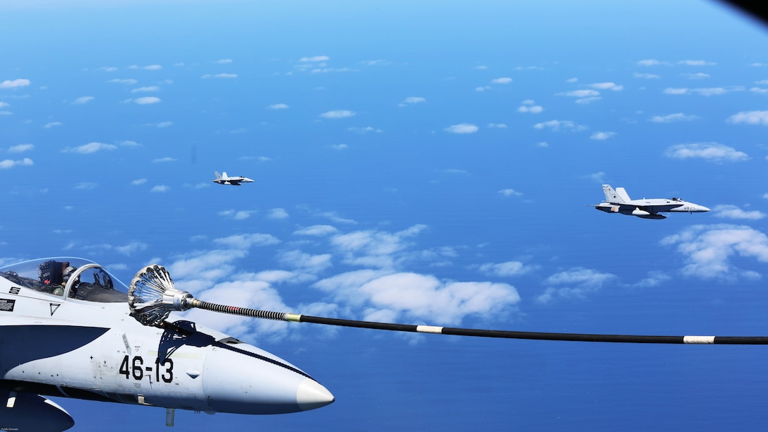 A Spanish Air Force F/A-18 Hornet with 462 Squadron receives fuel from a U.S. Marine Corps KC-130J with Marine Aerial Refueler Transport Squadron 252, Special-Purpose Marine Air-Ground Task Force-Crisis Response- Africa during an aerial refuel mission, Gran Canaria, Spain, Mar. 29, 2016. SPMAGTF-CR-AF Marines and Spanish airmen conducted air-to-air refueling missions in order to enhance crisis response readiness and help build relationships between the two militaries. 