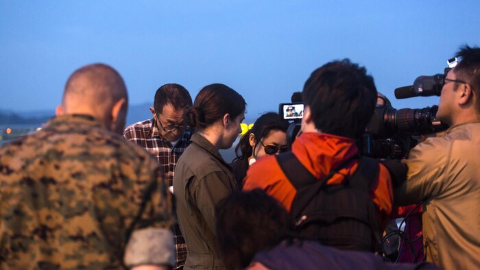 Japanese media interview Capt. Tessa Snow, an MV-22B Osprey pilot with Marine Medium Tiltrotor Squadron 265 attached to the 31st Marine Expeditionary Unit at Marine Corps Air Station Iwakuni, Japan, in support of the Government of Japan’s relief efforts following yesterday’s devastating earthquake near Kumamoto April 17, 2016. The long-standing relationship between Japan and the U.S. allows U.S. military forces in Japan to provide rapid, integrated support to the Japan Self-Defense Forces and civil relief efforts.